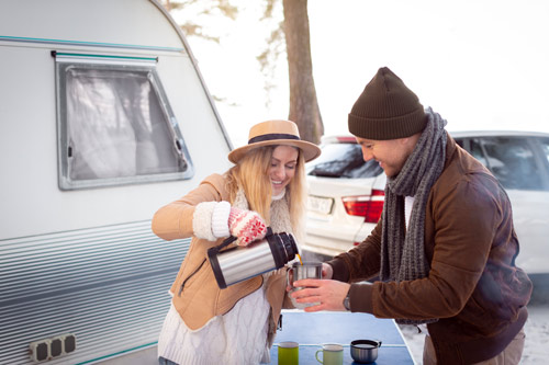 medium-shot-smiley-couple-with-hot-beverage